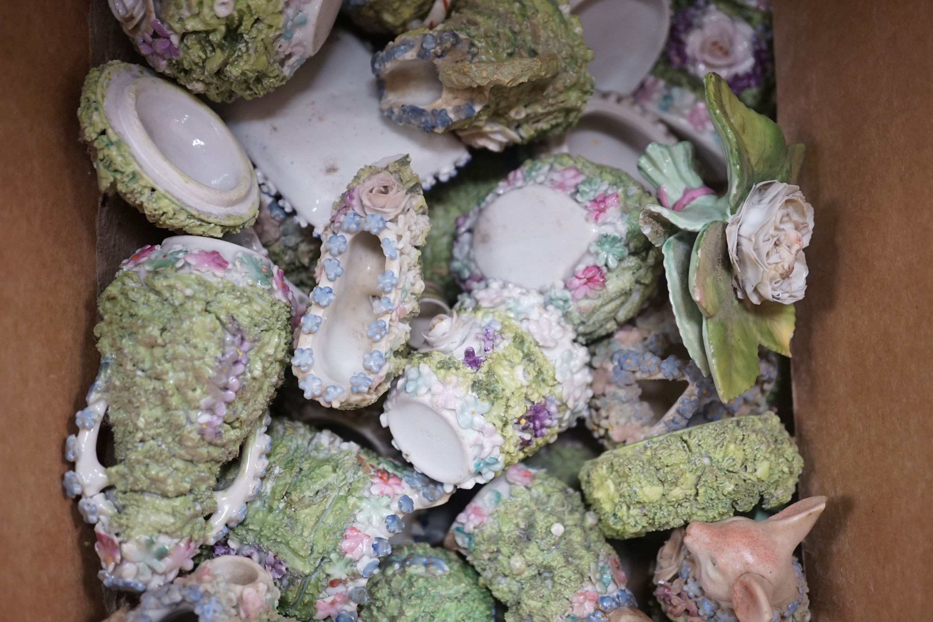 A quantity of floral encrusted mossware